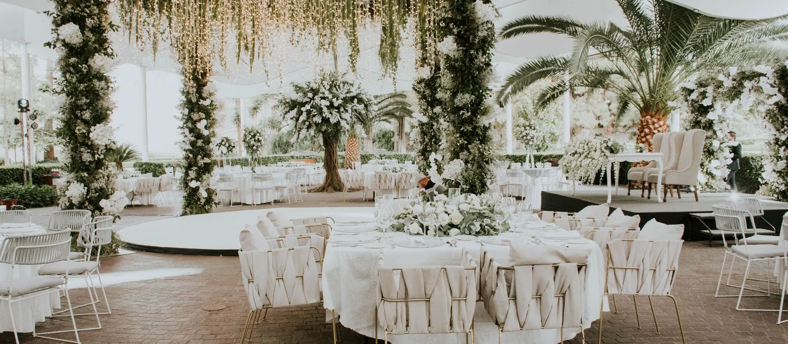 An elegant wedding reception setup, wedding planner web design by Designs by Delia