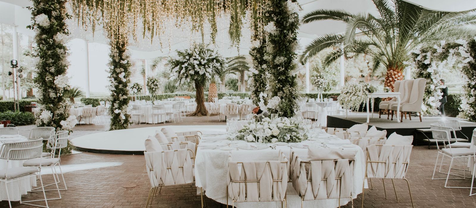 An elegant wedding reception setup, wedding planner web design by Designs by Delia