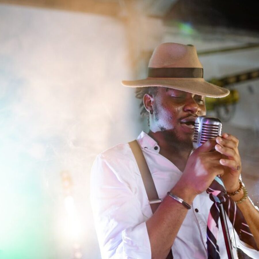A singer at a vintage microphone