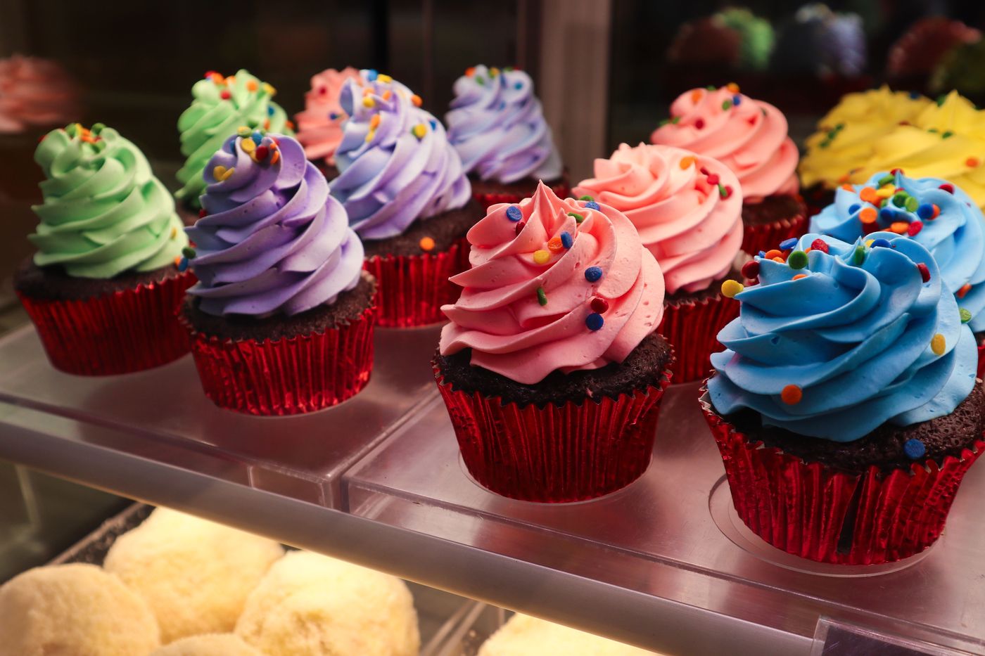 Frosted cupcakes with sprinkles